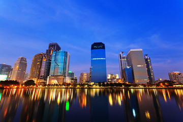 Bangkok in evening, reflection of buildings in water