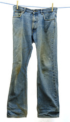 Muddy jeans on a clothesline