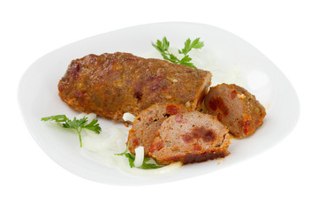 meat rolled with sausages on the plate