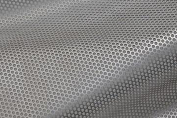 Metal sheet surface with holes