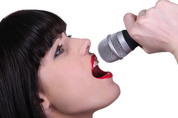 brunette woman singing