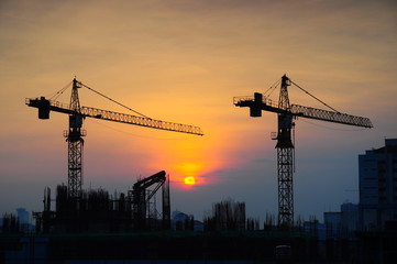 Crane construction at sunrise
