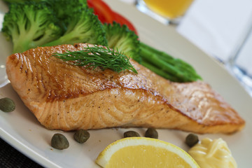 Salmon steak and cookeg vegetables