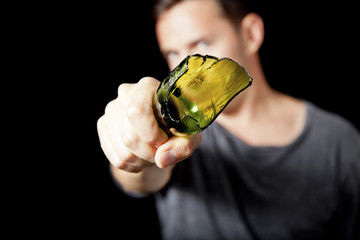 Man with broken beer bottle