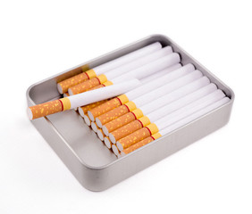 Cigarettes in metal box isolated on white background