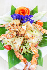 Thai seafood, crap salad with flower decoration