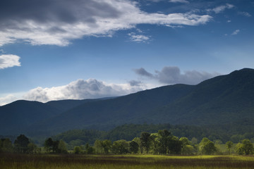 Fototapeta premium Dappled Sunlight Over Cades Cove in the Great Smoky Mountains