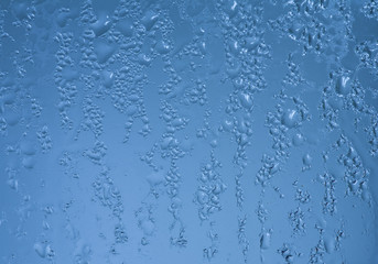 Series of the textures (Blue glass with drops)