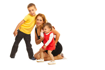 Mother posing with two kids