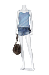 mannequin dressed in t- shirt and short jeans with bag