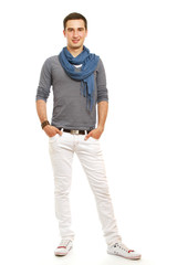 Fototapeta premium Self-confident young man with hands in pockets