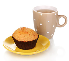 Fresh muffin with tea isolated on white