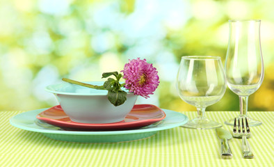 Table setting on bright background close-up