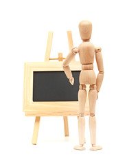 Wooden concept of mannequin in pose with wood frame