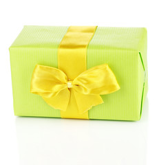 Colorful green gift with bow isolated on white