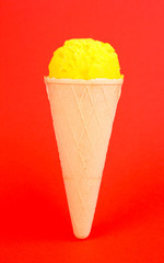 Scoop of the lemon ice cream in the waffle cone