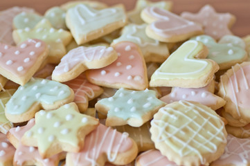 Pastel-coloured iced cookies