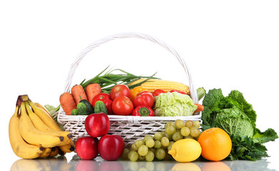 Composition with vegetables and fruits in wicker basket