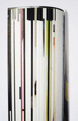 rolled up magazines, isolated, close up