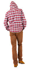 Back view of going  guy in a plaid shirt with hood