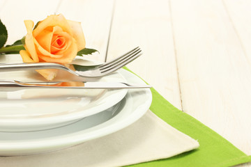 beautiful holiday table setting with flowers