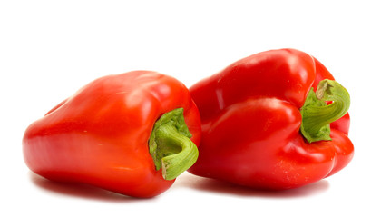 fresh red bell peppers isolated on white