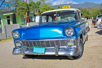 Printed roller blinds Cuban vintage cars Classic Chevrolet on January 20,2010 in Santiago de Cuba.