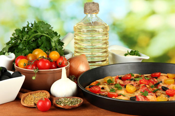 colorful composition of delicious pizza, vegetables and spices