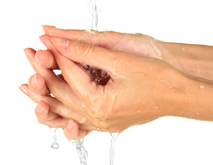 Washing hands on white background close-up