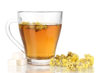 A cup of tea with immortelle isolated on white