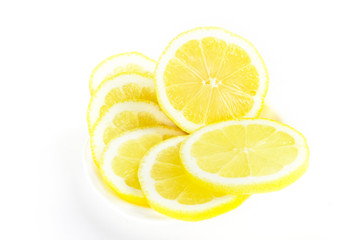 Fresh lemon fruit slices on white background