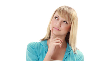 Fototapeta premium Pensive young woman looking at copyspace