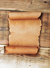 Paper scroll on wooden panel