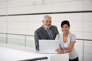 Boss and employee working in the corridor