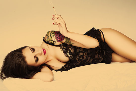 tattoo pin up girl with cigarette