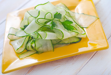 Fresh salad with fresh cucumber and parsley