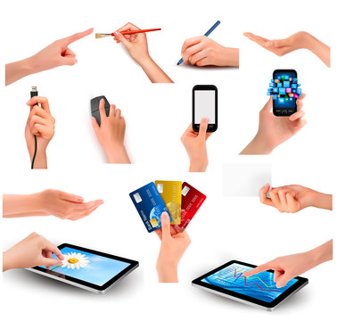 Set of hands holding different business objects
