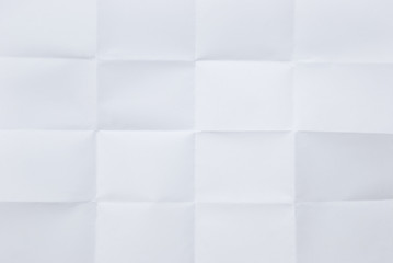 white sheet of paper folded in sixteen