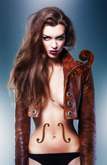 pretty beautiful erotic violin woman in brown jacket