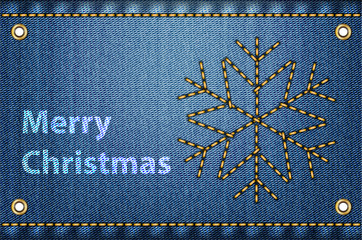 Christmas greetings on blue jeans background