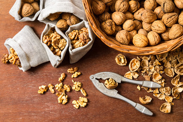 Walnut cracking and sorting them into bags