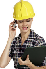 young woman architect with helmet