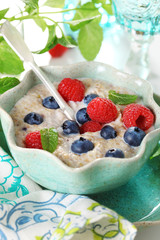 Oatmeal with fresh blueberries and raspberries.