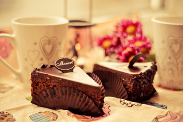 Two pieces of chocolate cake