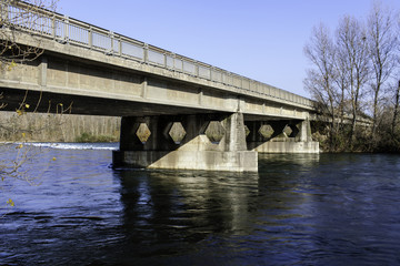 Road bridge over a river color image