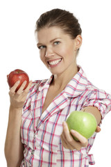 young woman showing apples