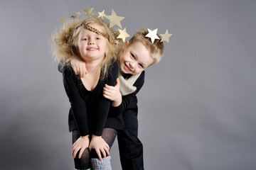 portrait of little boys and girls in the studio in a Christmas s