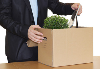 Jobless employee pack his personal belongings