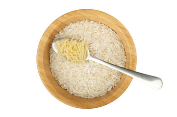 wood bowl with rice and steel spoon with vermicelli