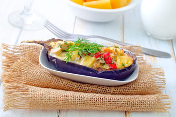 stuffed eggplants on the white plate